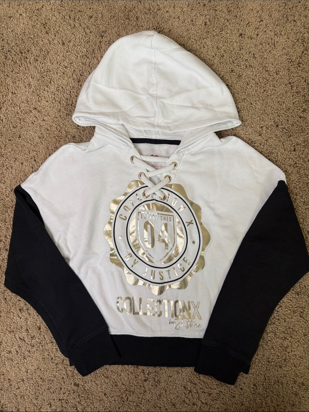 Justice White Hoodie with Black Sleeves and Gold Crest Accent